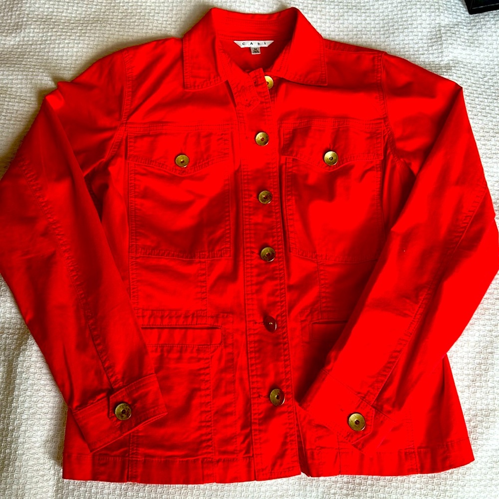 Cabi orange jacket with ruffled back. Size M